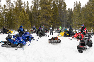 Photo of groups of snowmobilers