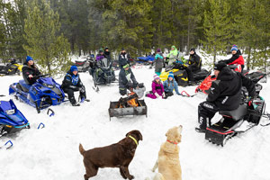 Photo of groups of snowmobilers