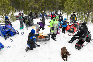 Photo of groups of snowmobilers