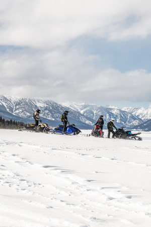 Photo of groups of snowmobilers