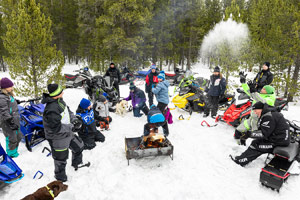 Photo of groups of snowmobilers