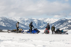 Photo of groups of snowmobilers