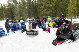 Photo of groups of snowmobilers