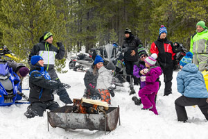 Photo of groups of snowmobilers