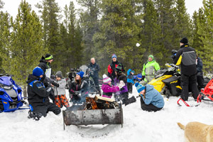 Photo of groups of snowmobilers