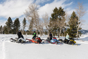 Photo of groups of snowmobilers