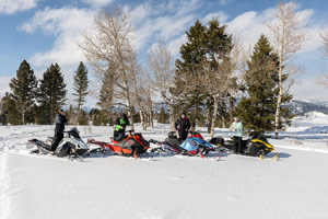 Photo of groups of snowmobilers