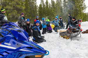 Photo of groups of snowmobilers