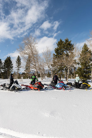 Photo of groups of snowmobilers