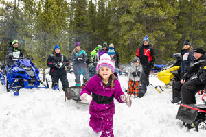 Photo of groups of snowmobilers