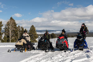 Photo of groups of snowmobilers