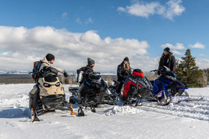 Photo of groups of snowmobilers