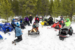 Photo of groups of snowmobilers