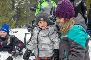 Photo of groups of snowmobilers