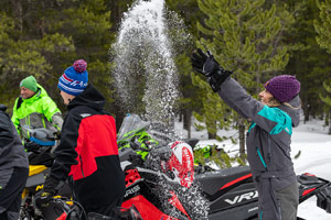 Photo of groups of snowmobilers