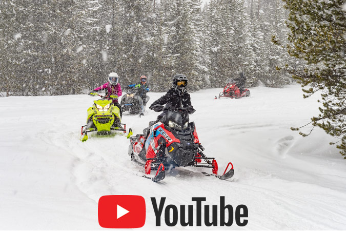 Snowmobiler being safe on a snowmobile